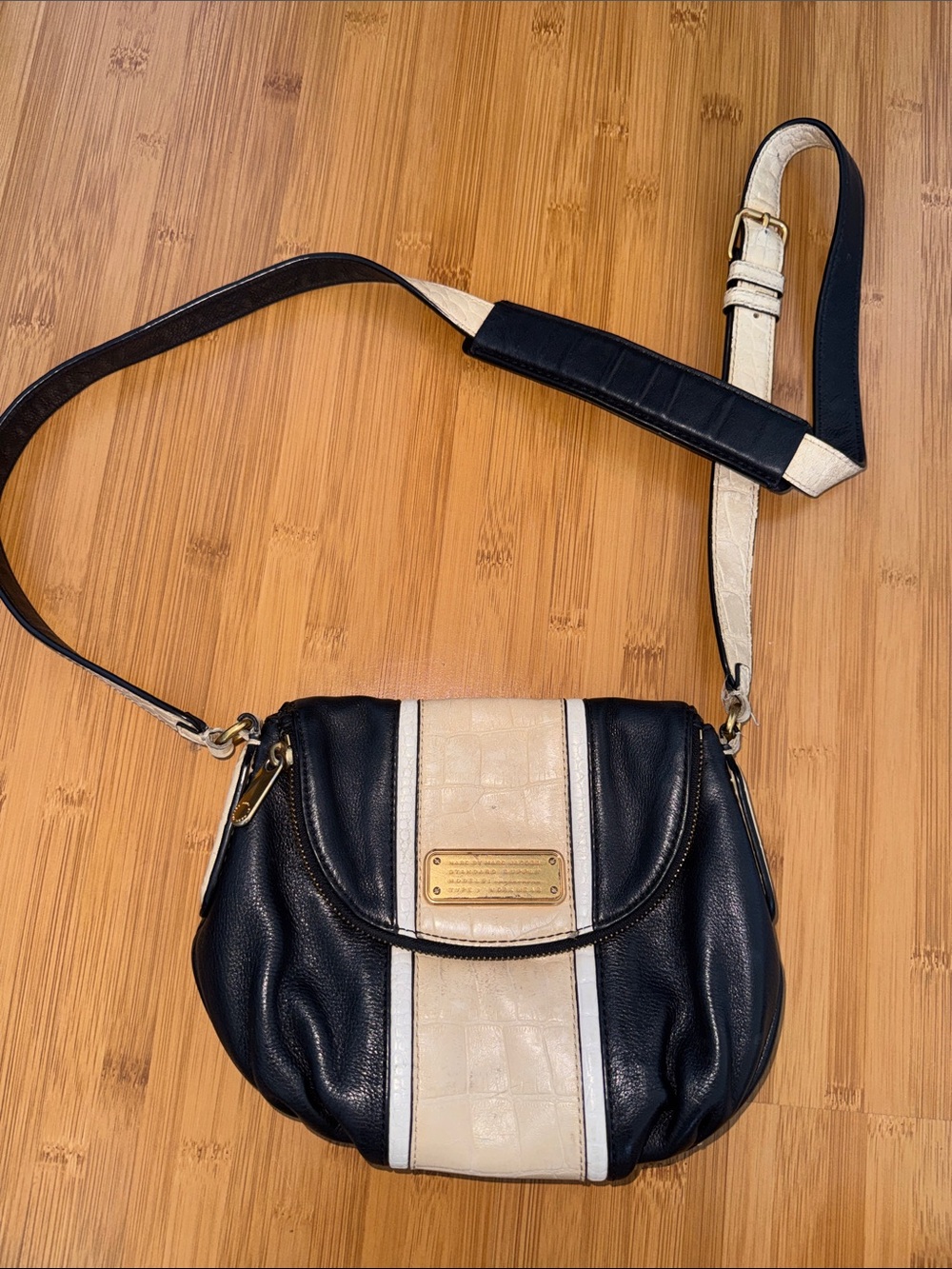 Black & Cream Crossbody Saddle Bag with Gold Accent